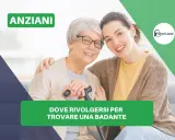Anziani sorridenti, una giovane donna abbraccia un'anziana con bastone. Guida su come trovare una badante.