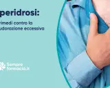 Uomo con camicia bagnata di sudore, che indica iperidrosi. Scopri i rimedi per la sudorazione eccessiva e i farmaci che la provocano.