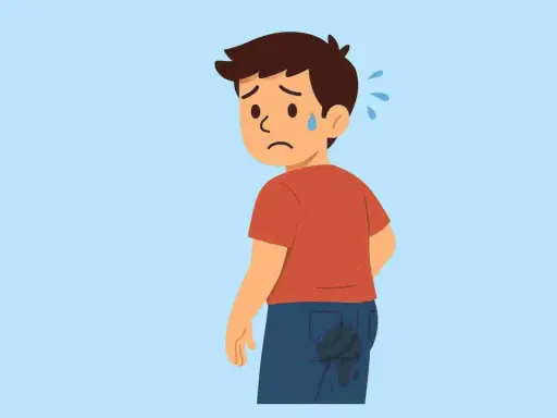 Ragazzo sudato con macchie sui jeans, preoccupato per il prurito tra le natiche. Rimedi urgenti!