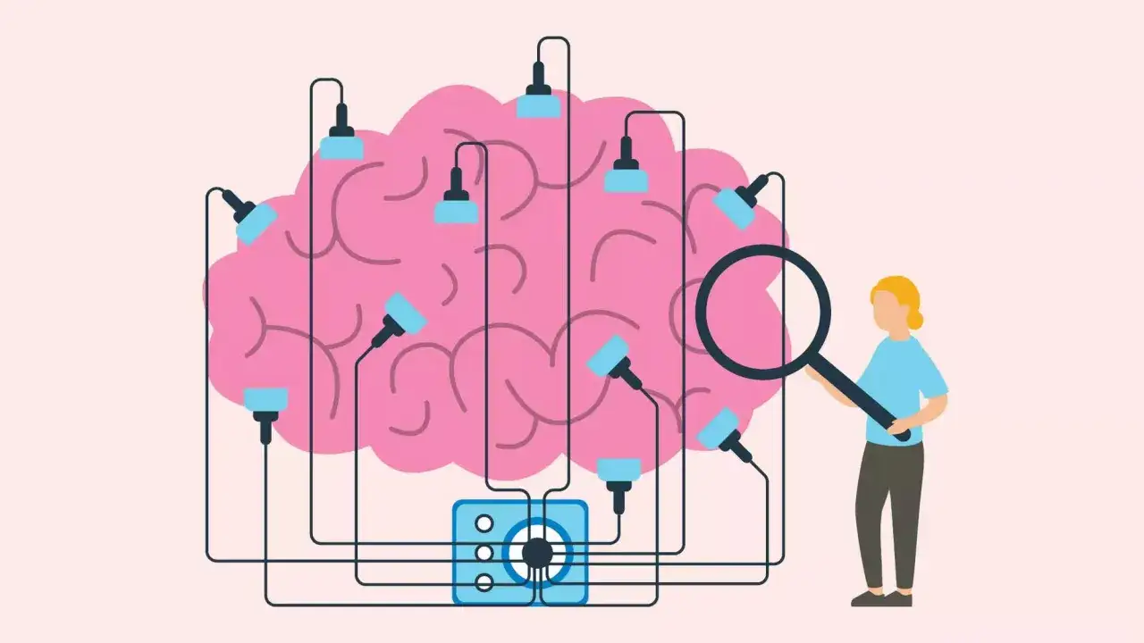 Una persona osserva un cervello stilizzato con cavi e luci, simbolo della plasticità neuronale e della sua esplorazione.